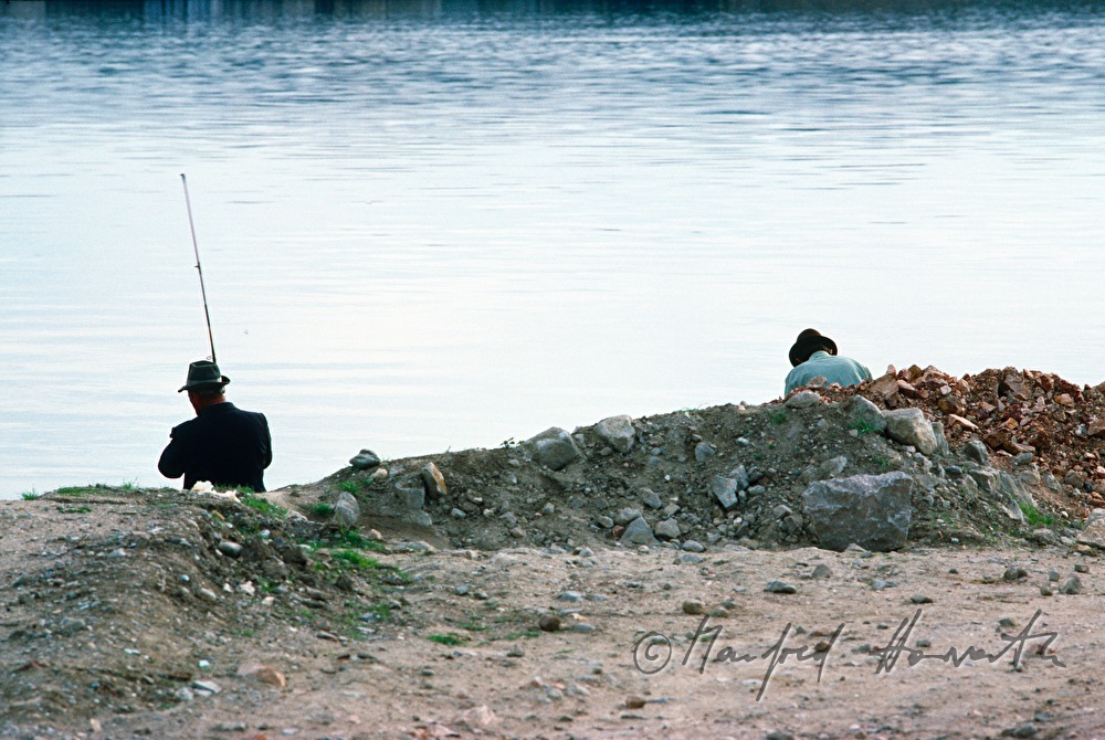 Fischer am Donauufer